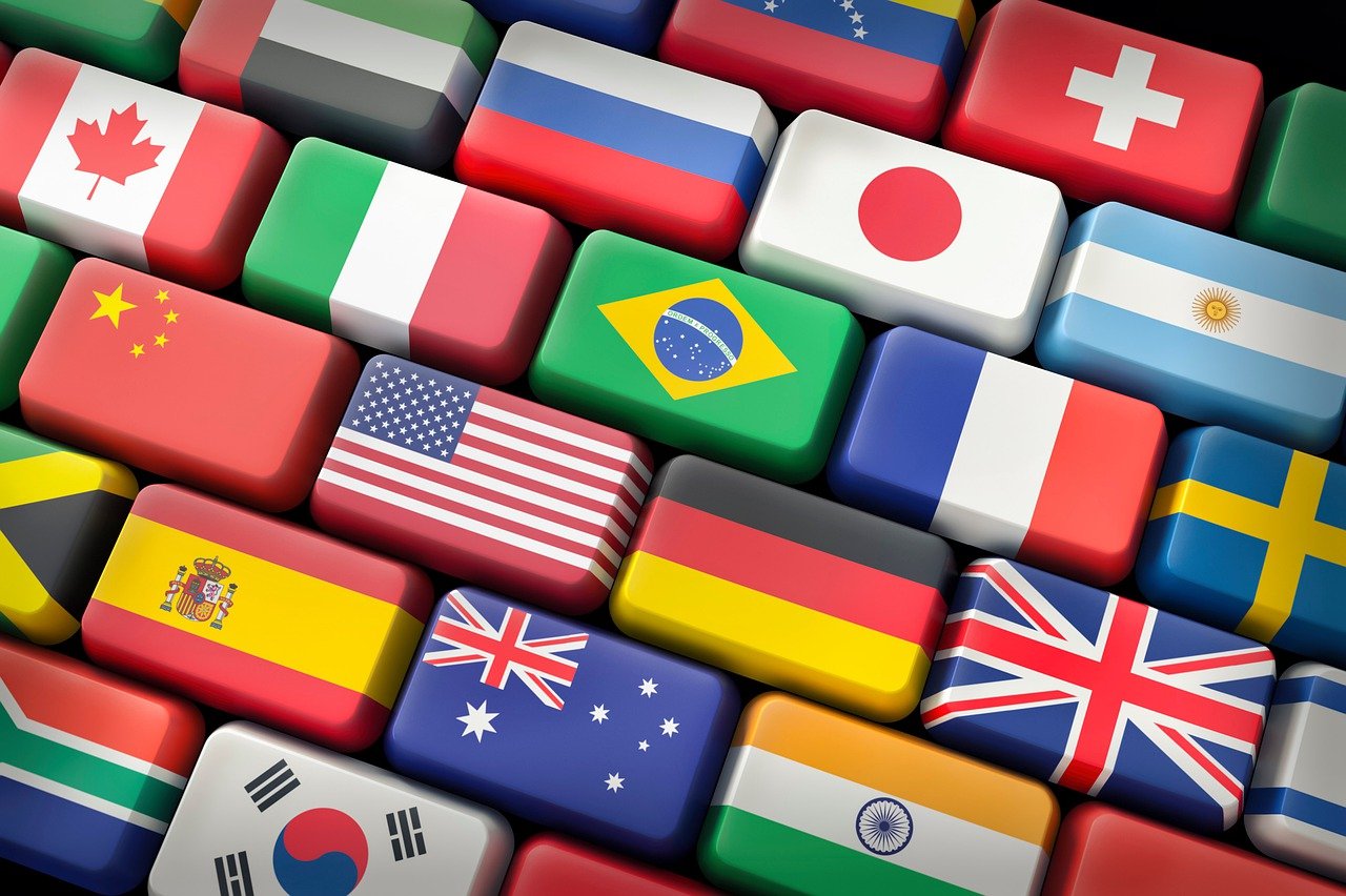 A photo from above of lots of brick-shaped flags of different nations